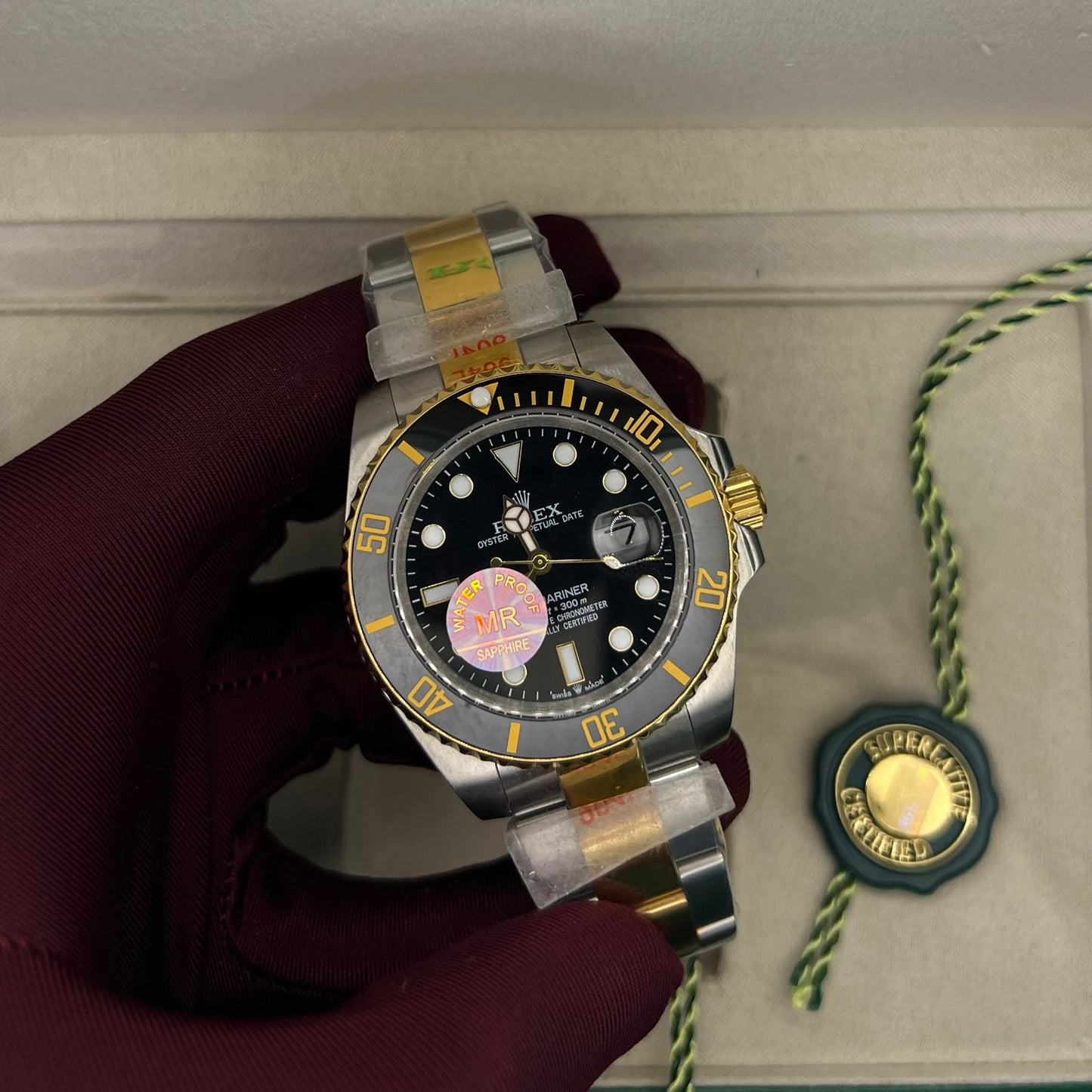 Submariner yellow gold and stainless steel case with a black dial
