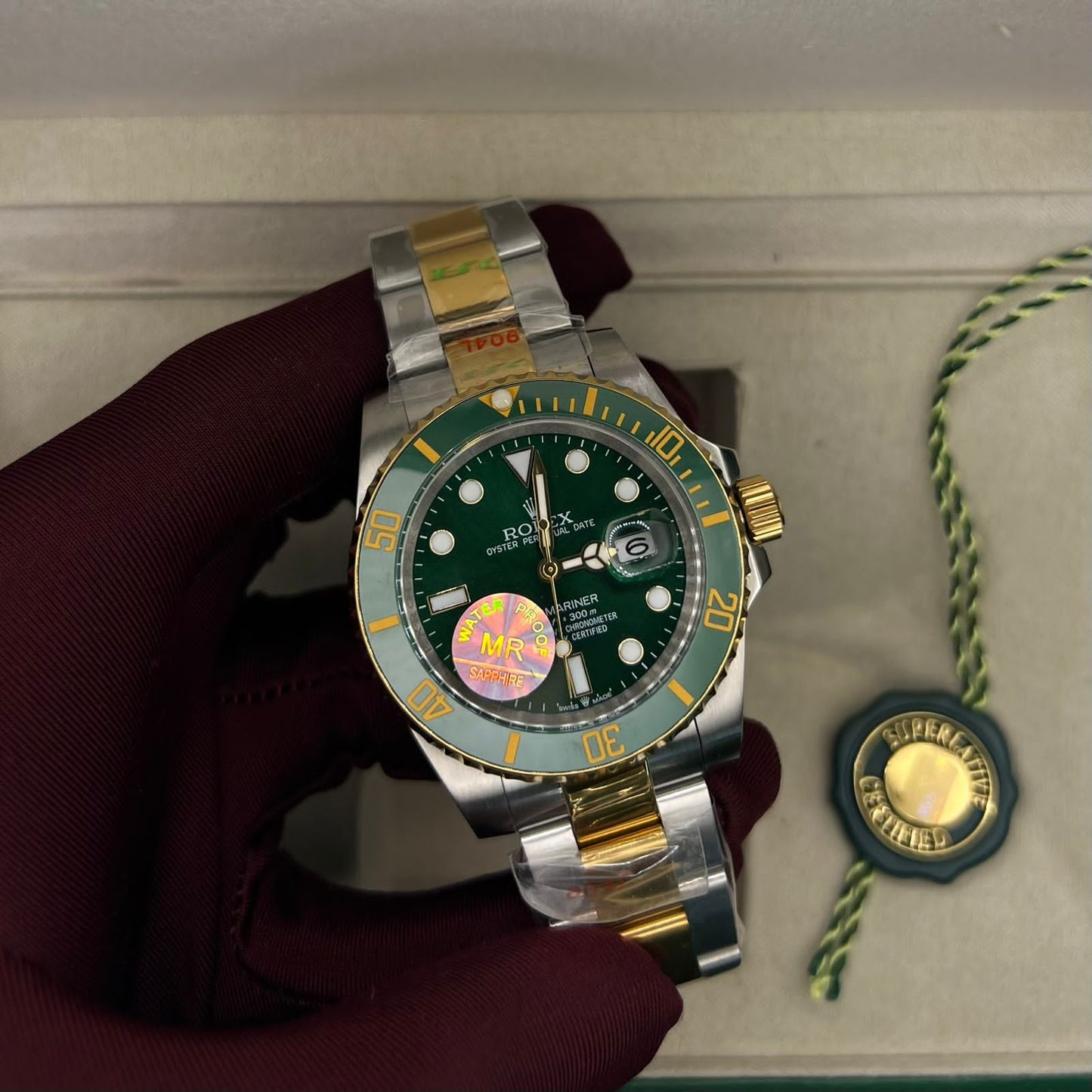 Submariner two-tone yellow gold and Green Dial