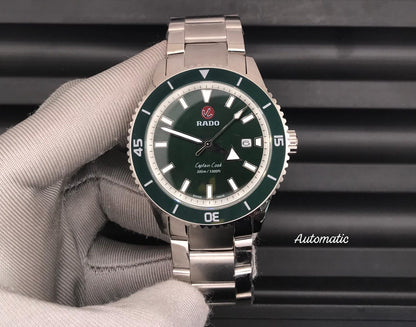 caption Cook  Green Dial