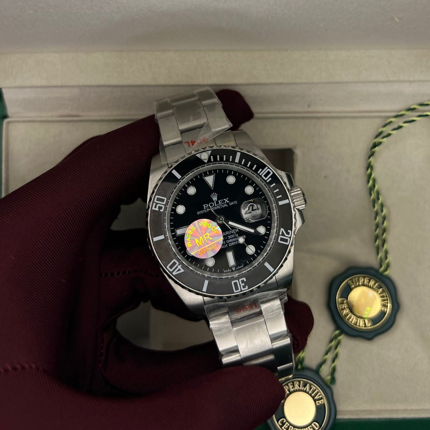 Submariner Date, stainless steel case and a black dial
